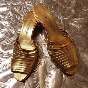 Like new , made in Italy, sz,8.gold in color,1 in.wedge real leather shoes